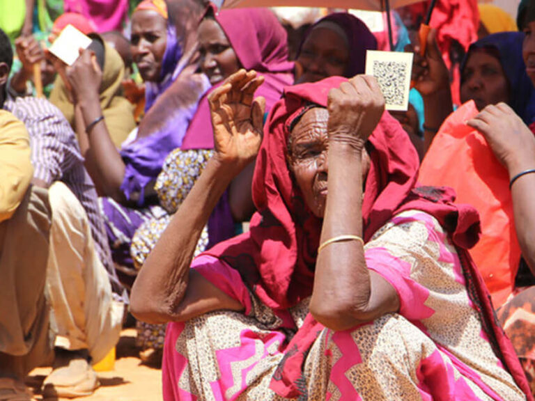 People sitting in the sun - Somaliland